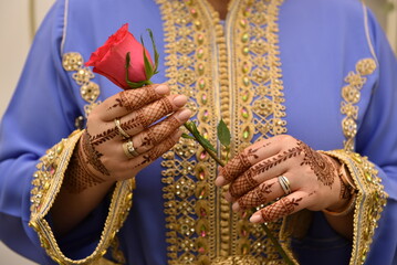 mehendi on the hands of girls,Woman Hands with black mehndi tattoo. Hands of moroccan bride girl...