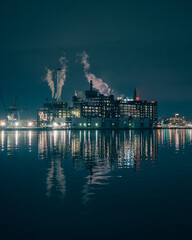 View of the Domino Sugar Factory at night in Baltimore, Maryland