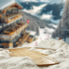 Desk of free space cover of snow and frost with blurred landscape of mountains in Alps. 