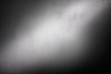 black metal texture with gradient. Light falls on metal. Background with glare on the surface