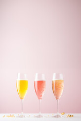 Effervescent Champagne Glasses with Sparkling Froth in Yellow and Pink Shades for Valentines Day Mock up