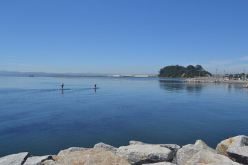 doing paddle board in the pacific ocean