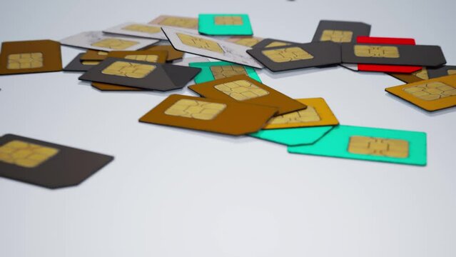  sim cards drop down and camera move ahead to zoom in for better closeup shoot. Many object on white background