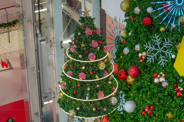 Hanging tree with Christmas toys and lights.