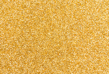 Golden glitter texture background with sequins and sparkles