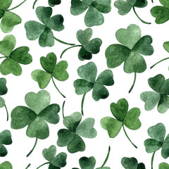 watercolor seamless pattern on the theme of st. patrick's day. green four-leaf clover leaves on a white background. holiday print - obrazy, fototapety, plakaty