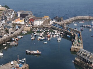 .Fishing boats moored Mevagissey  fishing village Cornwall drone,aerial
