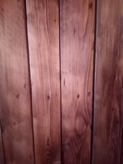 Naklejka premium wood texture background in brown red color. High quality photo. Can used for texture backdrop, background for floor goods, wallpapers, long vertical planks. 