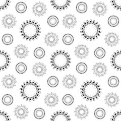 Seamless pattern with circle shaped snowflakes-like flowers. Hand drawn vector illustration.