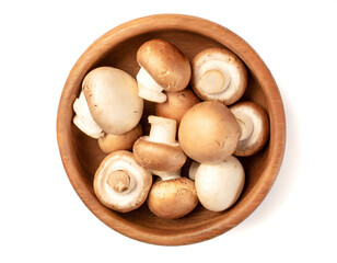 Wooden bowl with mushrooms isolated on white background, cutout,top view