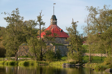 Fototapeta na wymiar View of the Lars Torstensson Tower (Pugachev Tower) of the ancient Korela fortress on a sunny October day. Priozersk, Leningrad region. Russia