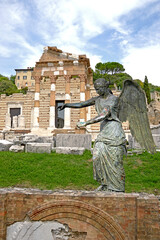 The Winged Victory and behind it the remains of the Roman Forum in Brescia - Italy