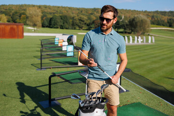 Ready to Tee Off: Youthful Golfer's Equipment Ritual
