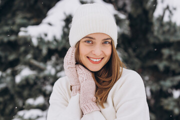 Portrait of a happy beautiful girl in a winter