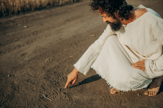 Divine Script: Jesus' Finger in the Sand