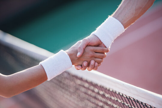 Couple playing tennis - Powered by Adobe