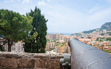 Fototapeta na wymiar View from fort wall and canon of Monte Carlo buildings built below hillside