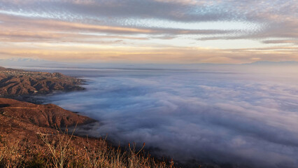 Overlooking the fog-filled Elsinore Valley in southern California