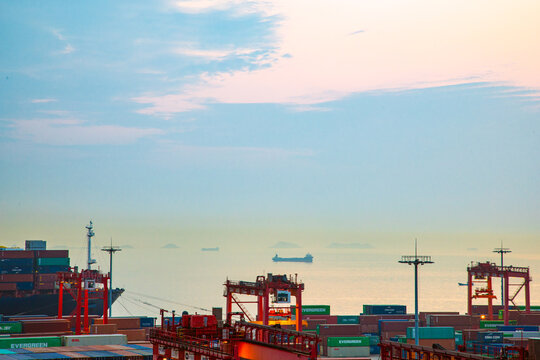 Yangshan Port, Zhoushan City, Zhejiang Province - sea view of the dock at sunset