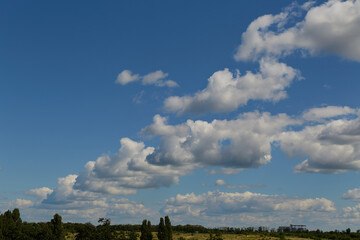Clouds in the sky above the ground, meteorological science, skyward view