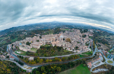 Italy, 08 December 2023 - panoramic aerial view of the medieval village of Urbino in the province of Pesaro and Urbino, a UNESCO heritage site