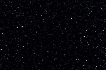 Fototapeta premium Dark blue night sky with stars. Galaxy space background. Glowing stars in space. New Year, Christmas and Celebration background concept. 