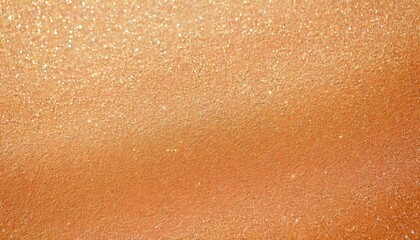 golden glitter texture in Peach Fuzz colors, background with selective focus and copy space