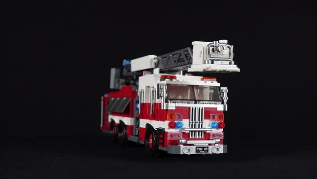 Rotating Constructor Fire Truck With Cradle on a White Background.