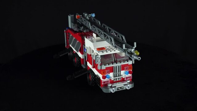 Rotating Constructor Fire Truck With Cradle on a White Background.
