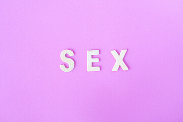 sex letters on pink background