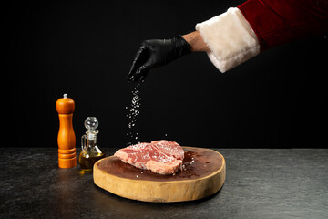 T-Bone con mano de Santa Claus