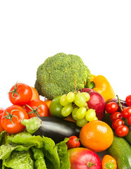 Set of vegetables and fruits isolated on a white. Vertical photo. Free space for text.