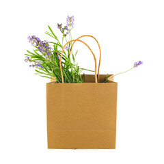 Bouquet of lavender flowers in paper bag isolated on white.