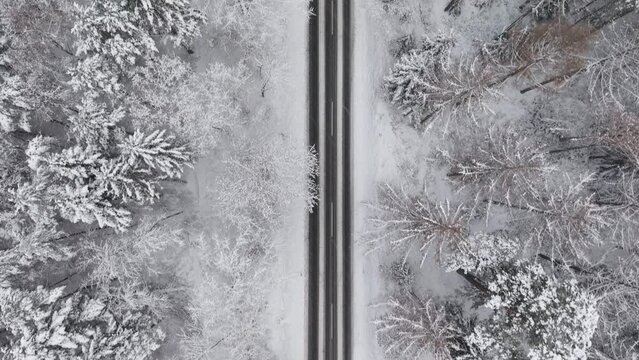 Aerial view of a snowy road in northern germany