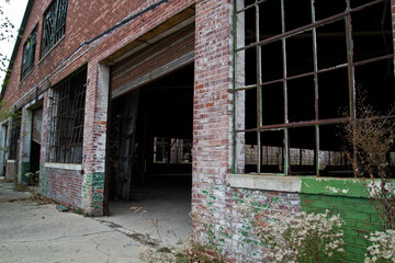 Fototapeta na wymiar Neglected Industrial Warehouse in Urban Decay, Warsaw Indiana