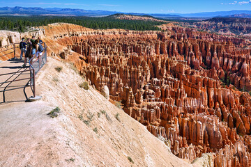 Tourists looking at the panorama at the Inspiration Point Lookout in the Bryce Canyon National...