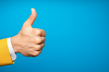 Businessman raises thumb up, satisfaction evaluation after using product and service concept, blue background