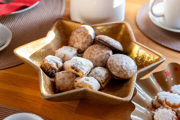 a table set for christmas with gingerbread
