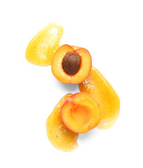 Sweet apricot and smear of jam on white background