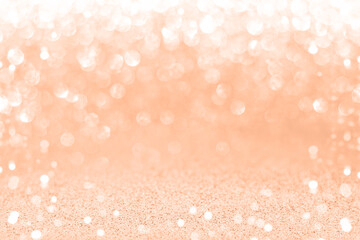 Color of the Year 2024 Peach Fuzz. Glitter texture christmas background.