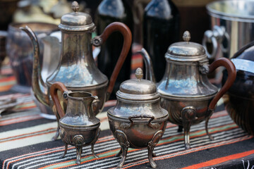 Metal pots at street market.