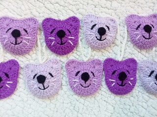 heted animal faces, crochet cats, multicolor handmade for illustration. home decoration pictures or a small child's bedroom