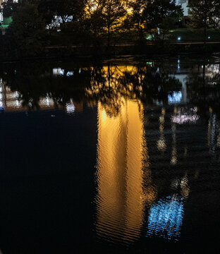 city reflection in water