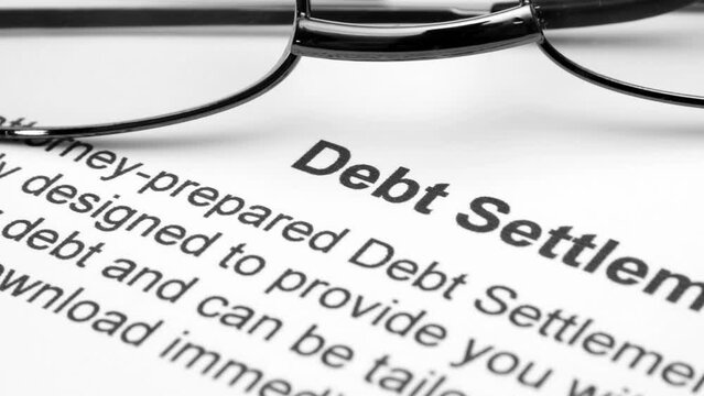 Close up of debt settlement dolly shot