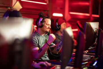 Esports Gamer Celebrating Victory at Gaming Tournament