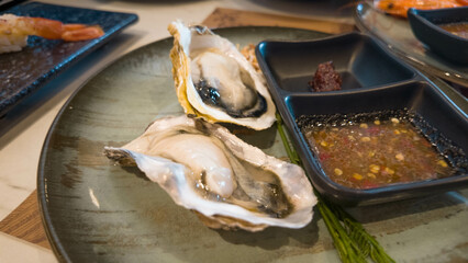 oyster seafood shell fresh sea raw luxury delicious background lamon gourmet plate open ice healthy...