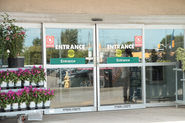 entrance outside exterior outdoors with closed automatic glass entrance doors