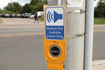 button for audible signal only crosswalk button with illustration of speaker making noise with road...