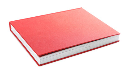 Book with red cover on white background - obrazy, fototapety, plakaty