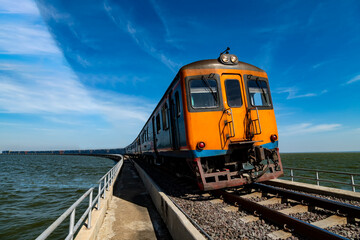 Thai locomotive train on the bridge over the Pa Sak River beautiful country of thailand at Pa Sak Cholasit Dam Lopburi Province